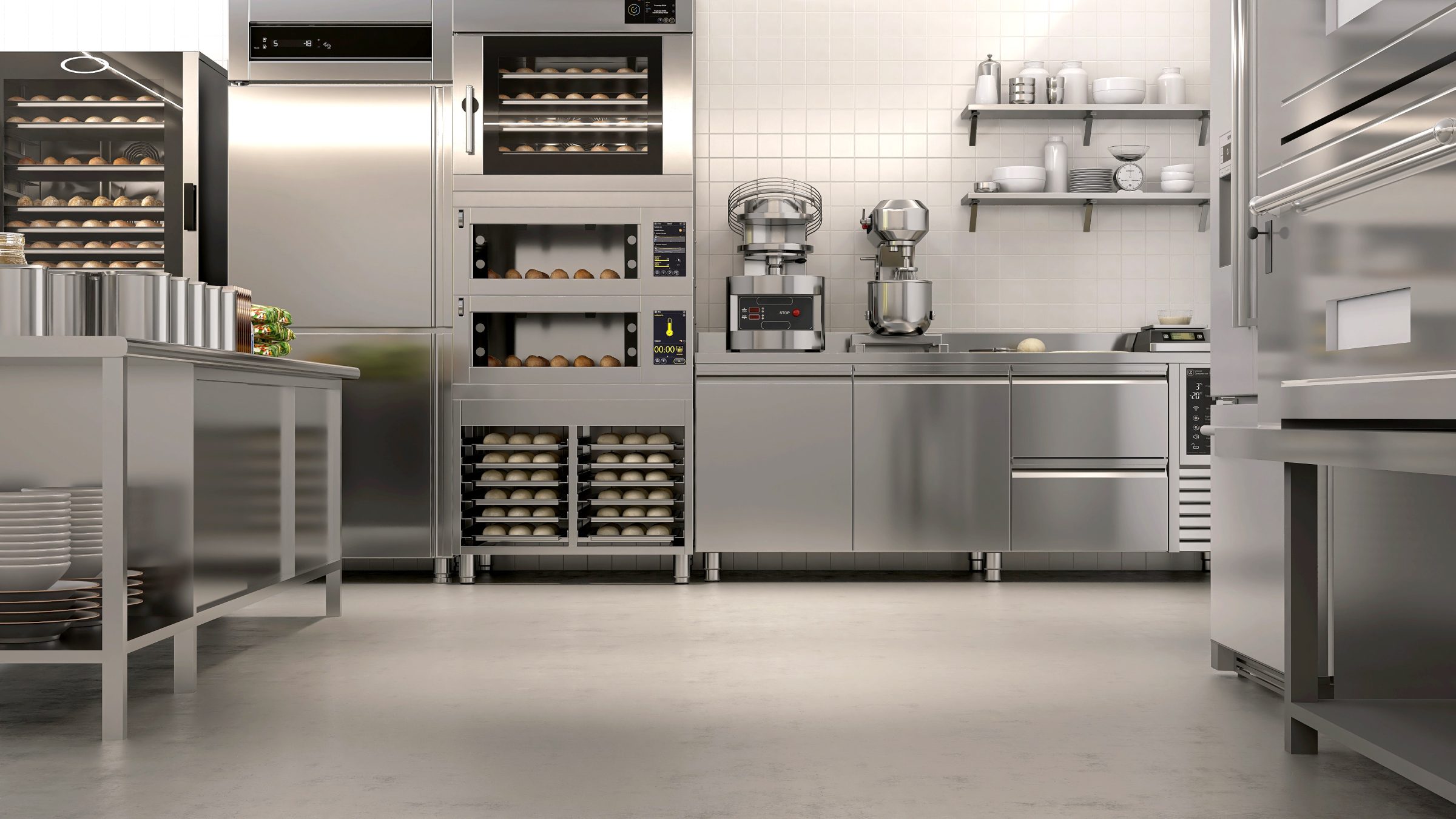 Commercial kitchen with stainless steel cooking equipment and preparation areas